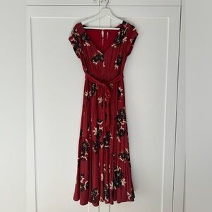 Free People midi dress with floral pattern. Size 0, gently used, good condition.